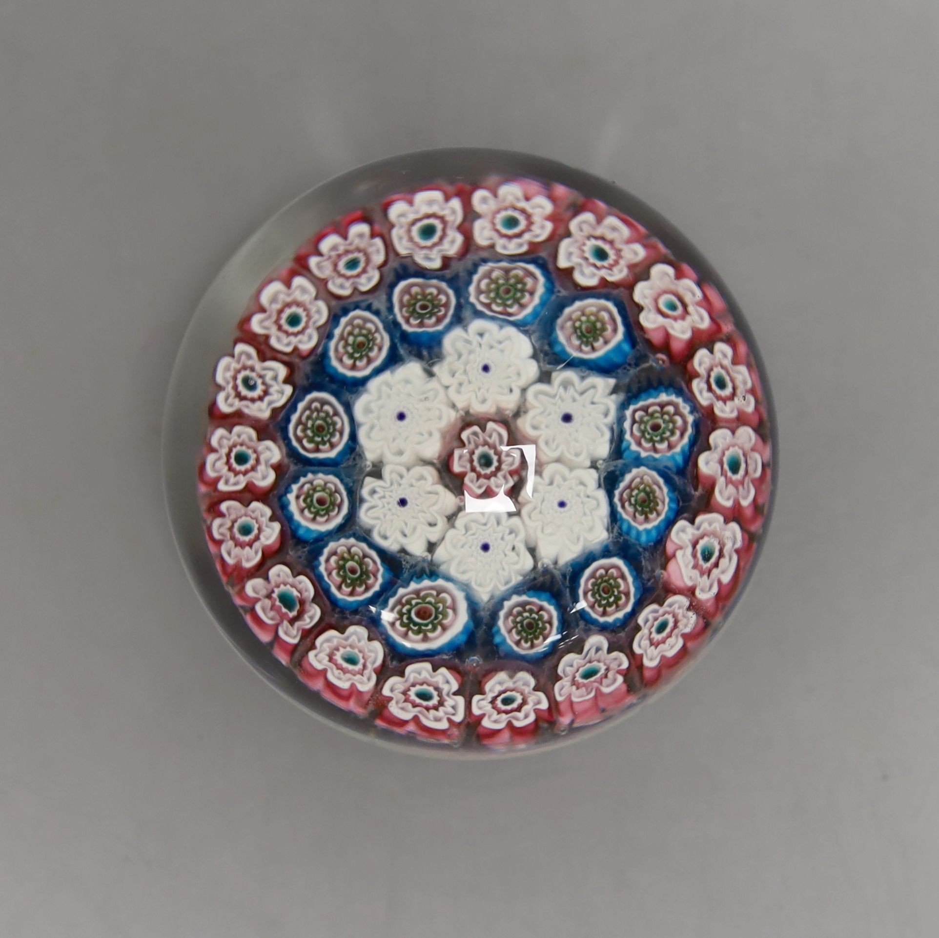 A Murano Millefiori glass paperweight - 7cm diameter